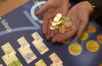 Euro coins and bills