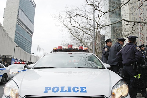 NYPD officers stage their vehicles in front of United Nations Headquarters, preparing for a counter-terrorism drill.